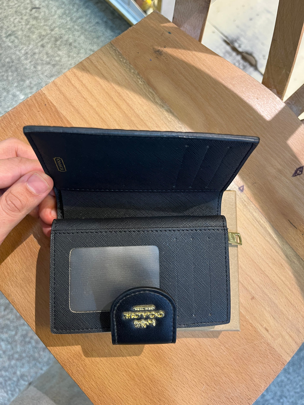 Coach women’s pouch ( matte black